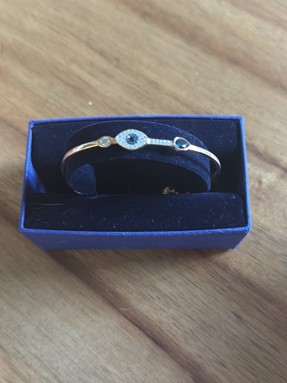 Gold Evil Eye Bangle Bracelet with Blue Accents